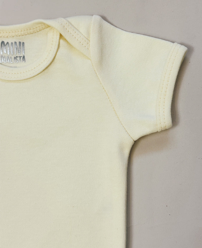 Body de Bebê Manga Curta Unissex | Liso Manteiga