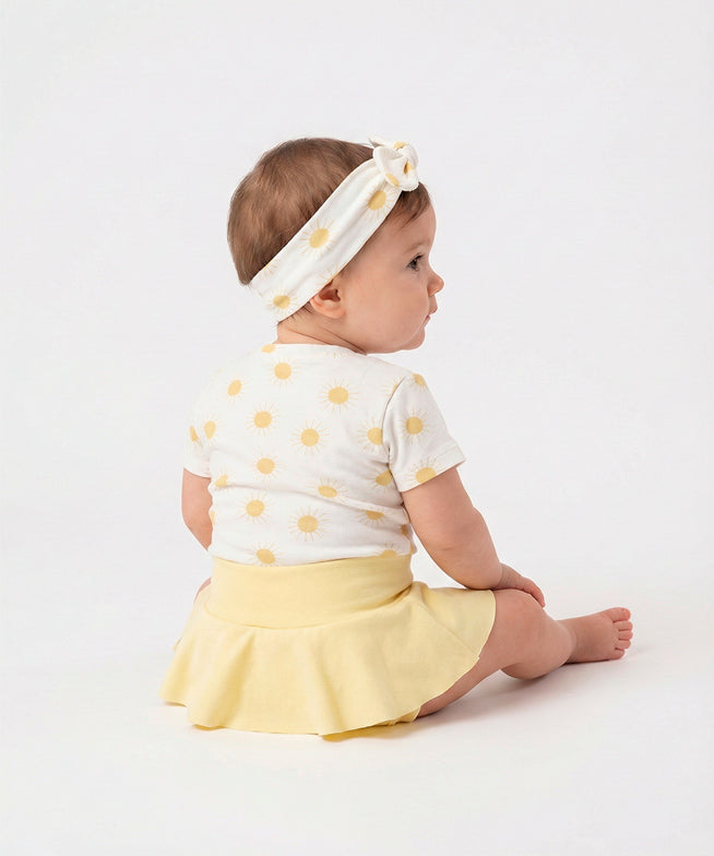 Conjunto-verao-bebe-menina-camiseta-solar-saia-boomies-amarelo-manteiga-faixinha-solar-2_13a35563-1749-4539-8d38-f0ce8b03f3ea.jpg