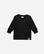 Blusa Térmica Unissex Minimalista Liso Preto vista geral da peça — segunda pele de alta performance, microfibra 92% Poliéster + 8% Elastano com Shape Memory, anti-pilling e Proteção UV 50+. Unissex menino e menina.