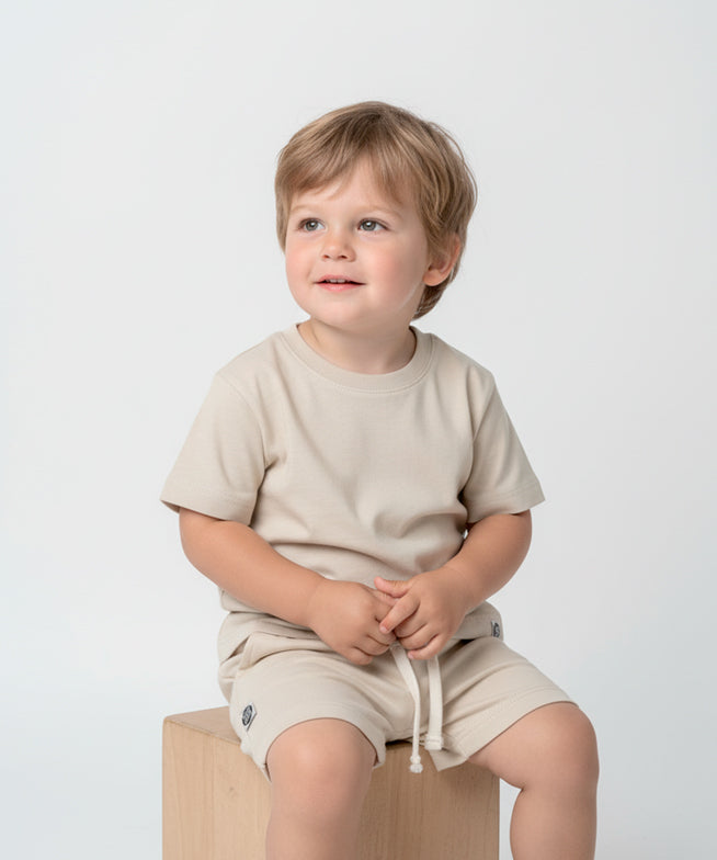conjunto-camiseta-e-bermuda-menino-liso-beige-sand-1_f9f01334-1b62-4b5c-ae22-3b8e7425ab69.jpg